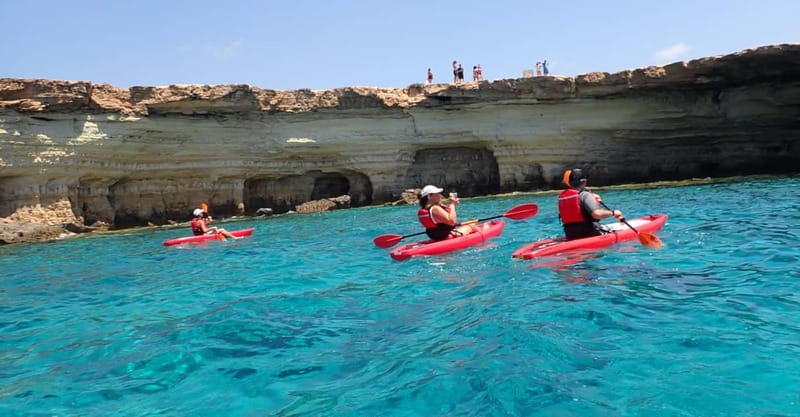 5-hour Cape Greco Caves kayaking + Snorkelling trip - Limnara Beach setup: single kayaks, drybags, and getting comfortable