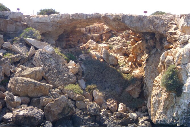 APHRODITE II -LAZY DAY CRUISE-BLUE LAGOON,TURTLE COVE, with LUNCH - Crow’s Arch and a seaside chapel view from the water