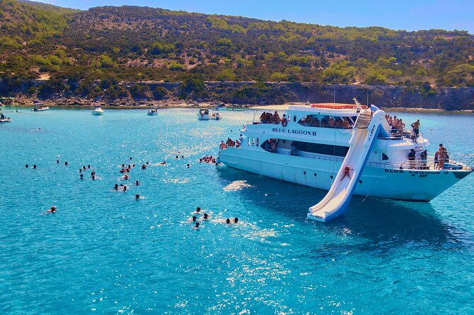 Blue Lagoon (Akamas) Bus & Boat Tour with Water Slide From Paphos - Stairs, Life Vests, and Why Boarding Can Feel Chaotic