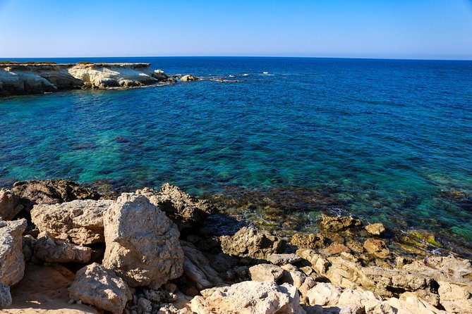 Blue Lagoon and Aphrodite's Baths Guided Day Tour from Paphos - Latchi Harbour break: where the day slows down for lunch and atmosphere