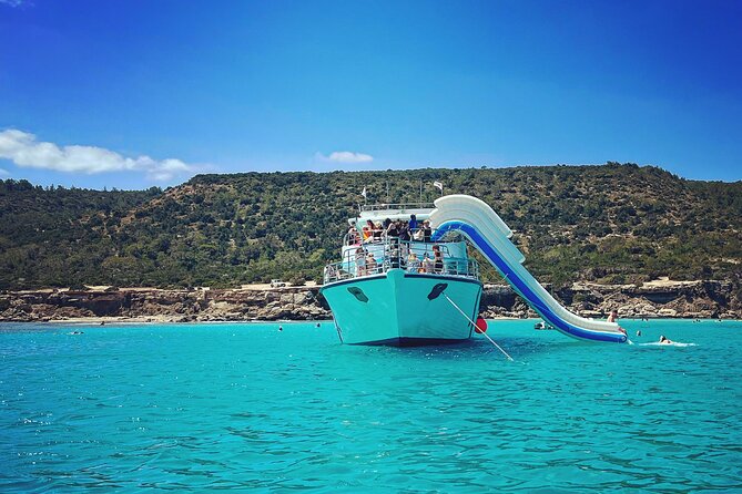 Blue Lagoon cruise: giant slide, music & Paphos hotel transfers - Key highlights