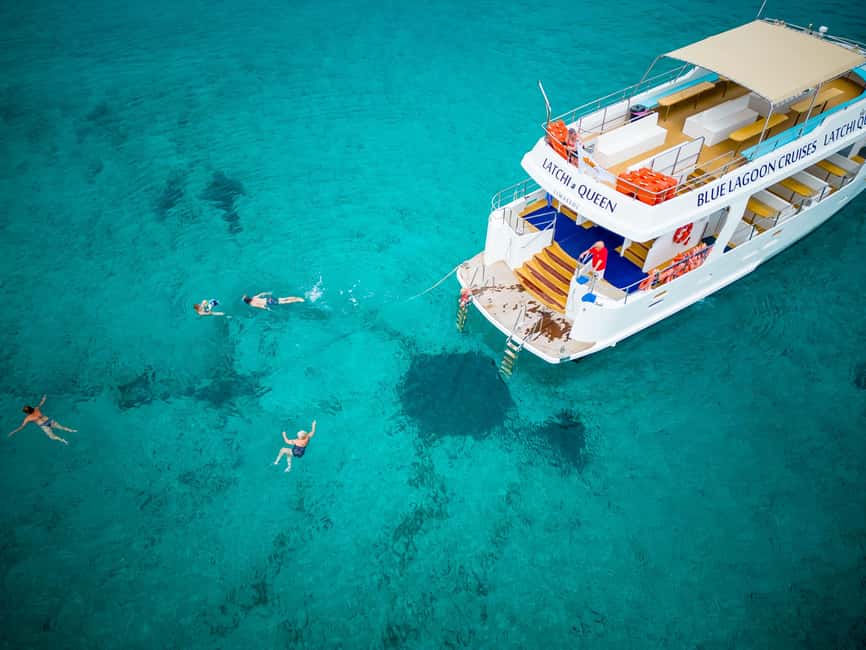 Blue Lagoon Half Day Tour with Water Slide from Paphos - Onboard treats: wine, juice, and seasonal fruit