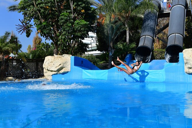 Fasouri Watermania Waterpark Admission Ticket - The wave pool and slide lineup: the main event for thrill seekers