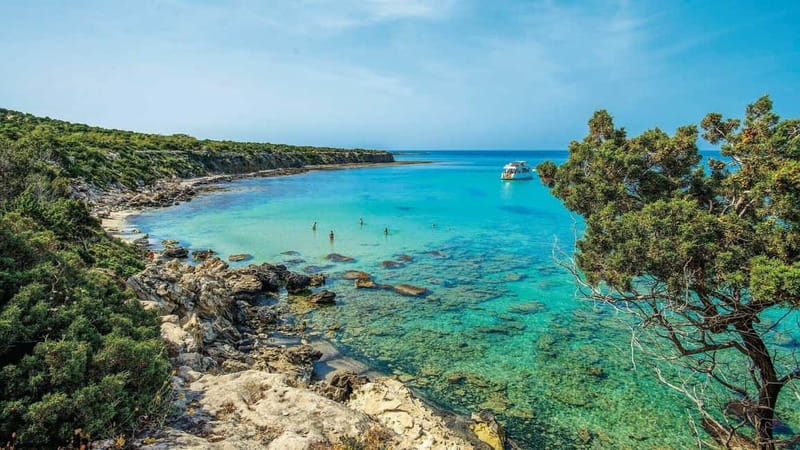 From Paphos: Baths of Aphrodite, Latchi & Blue Lagoon Cruise - Myth at the Baths of Aphrodite, then a real port town