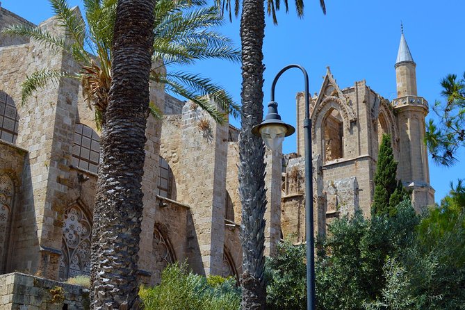 Ghost-Town Famagusta Mini Bus Tour from Protaras and Ayia Napa - Stop 1 in Derynia: Film, Rooftop Viewpoint, and Binocular Help