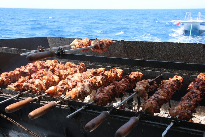 Half-Day Odyssey Guided Boat Safari with Lunch in Cyprus - Cape Pyla caves and Red cliffs: the scenic pass you still feel