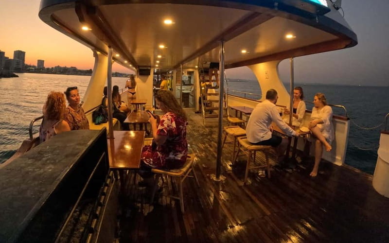 Larnaca: Sunset Cruise with a Glass of Wine - Onboard activities and the Olga factor at the dance finale