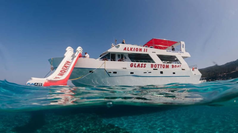Latchi: Blue Lagoon Glass Bottom Boat Cruise with Drinks - Cruise highlights: Baths of Aphrodite, Saint George’s Island, and the mountain chapel