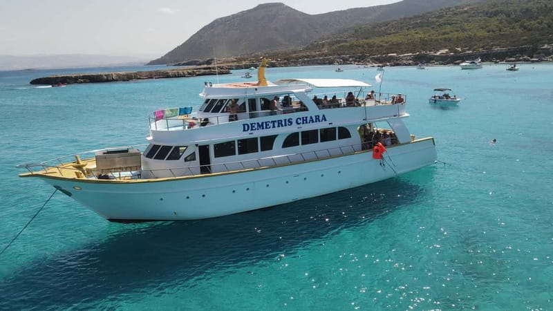 Latsi: Blue Lagoon Boat Trips with Traditional BBQ - The coastal cruise: Aphrodite’s Baths to the edge of Akamas