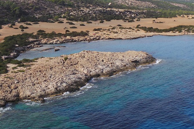 Luxury Eden 18 Private Self-drive boat hire to Blue Lagoon & more - Manolis Bay and Amphitheatre: blue water with character