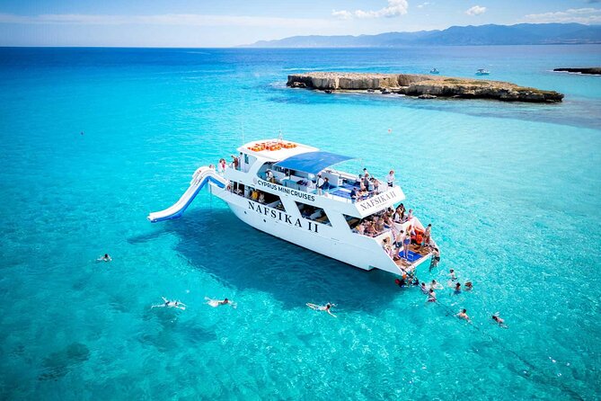 Nafsika II Half Day Cruise Swimming to blue lagoon water slide - One Hour at Blue Lagoon: Snorkeling Gear, Water Slide Fun, and Included Drinks