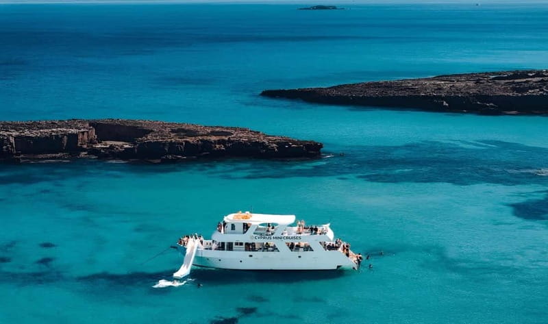 Paphos: Blue Lagoon Afternoon Cruise with Swim, BBQ & Wine - Akamas sea bays from the water, not from a parking lot