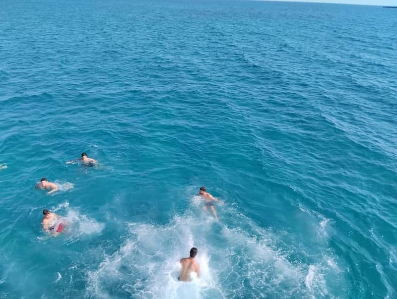 Paphos: Glass Bottom Boat Trip with Swimming or Snorkeling - Your swimming and snorkeling stop: where the water matters most