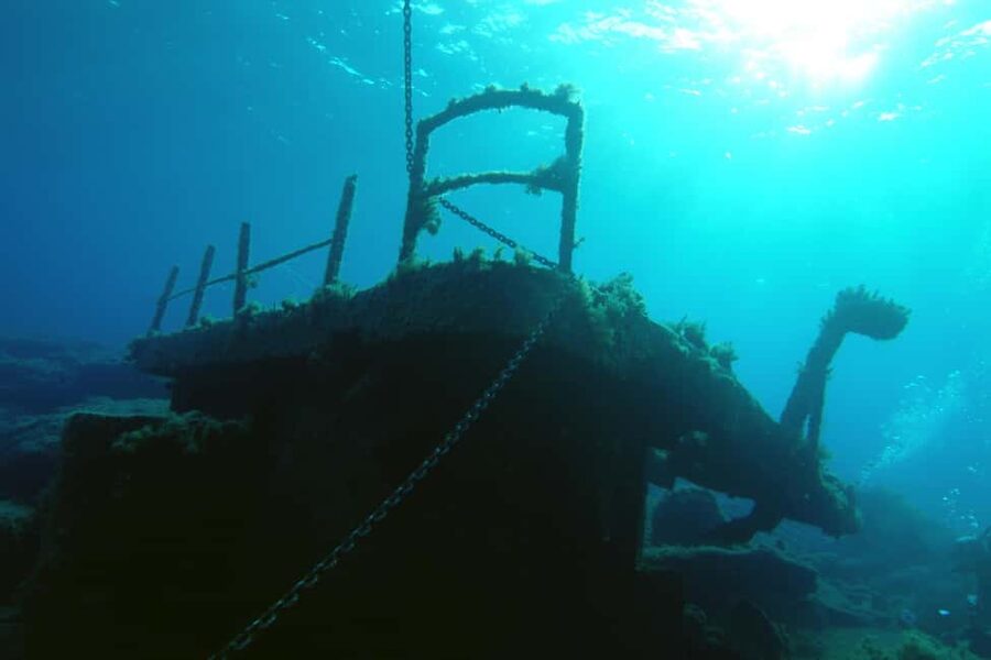 Paphos: The Yellow Glass-Bottom Boat Cruise Swim & Snorkel - Sailing to the Moulia Islands: Photos, Rock Shapes, and On-Water Storytelling