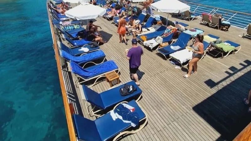 Paphos: Wave Dancer Sunset Cruise with BBQ and Swimming - Sailing the East coast toward Ricos Bay, and how to get the best viewing spot