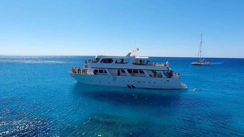Protaras: 80s and 90s Sunset Cruise with Cypriot Dinner & DJ - Sunset in Protaras: dancing under the sky, then back to shore