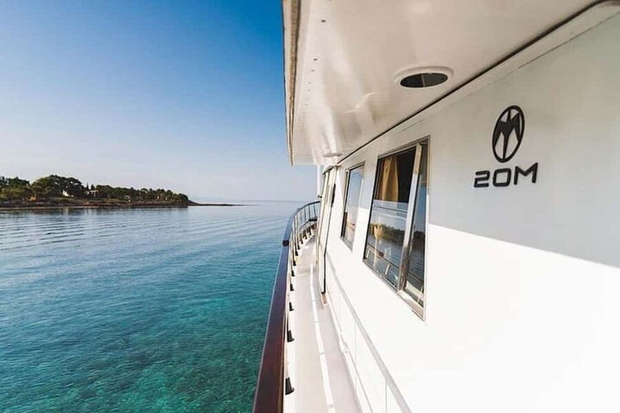 Protaras: Adults Presidents Cruise with Slide, BBQ & 1 Drink - Blue Lagoon swim and the slide moment, when conditions cooperate