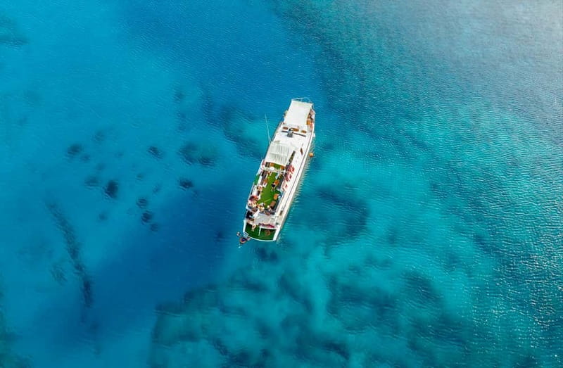 Protaras: Waterworld Turtle Cove Cruise with Swim Stops - Meeting the St Georgios Pier, then plan for stairs and sunscreen