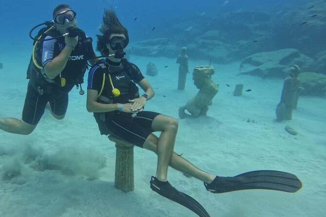 Scuba Diving Adventure at Green Bay Beach - Ancient Greek Statues: Photos, Videos, and Posing Underwater