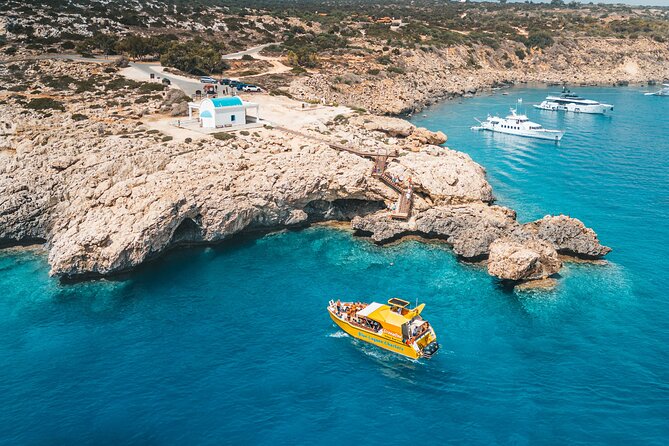 Yellow Boat Cruises: Afternoon Family Blue Lagoon & Turtle Cruise - Stop 5: Ayioi Anargiroi Church, sea caves, and cliff-side drama