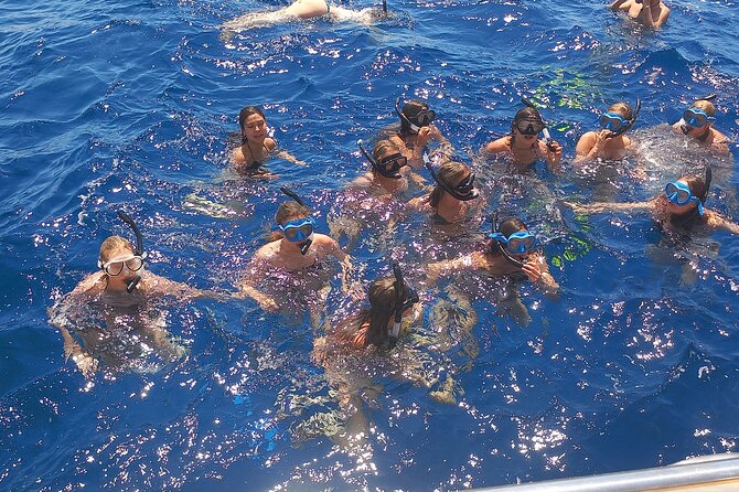 Yellow Submarine Swimming Cruise with Unlimited Drinks - Stop 3: Mackenzie Beach Swim Time in Clear Water